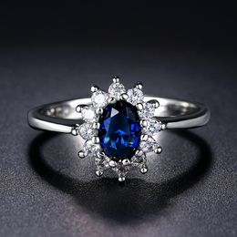 Cluster ringen Lady Princess Diana voor vrouwen Bruids Blue Crystal Wedding Engagement belofte Huwelijksring voor vrouwelijke mode -sieraden 076 230424
