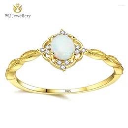 Cluster anneaux psj bijoux blanc / bleu ovale coupe opale incrustation rhodium gold plaqué promesse solitaire 925 argent sterling pour le mariage des femmes