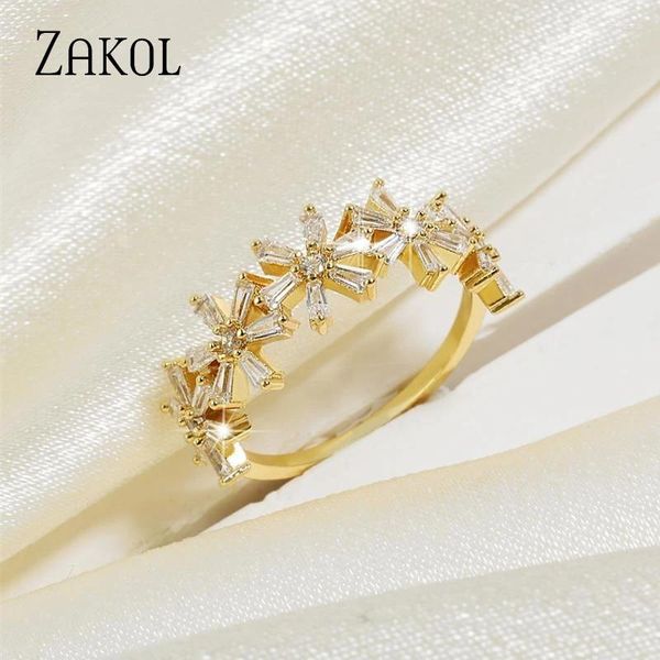 Cluster Anneaux Zakol Exquis Gold Color Fleur Zircon pour femmes Géométric Water Drop Cz Ring Bridal Wedding Bijoux