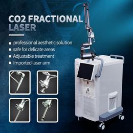 Machine laser fractionnée Co2 10600Nm Cosmétique Resurfaçage des cicatrices d'acné Serrage vaginal Matrice de points Radiofréquence Rajeunissement de la peau531