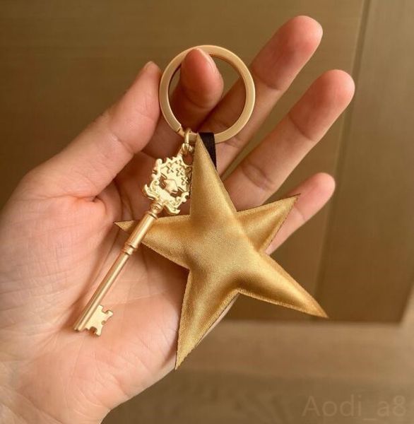 CoCo Diseñador Llaveros Muy bonito Llave de oro Colgante de equipaje Lindos llaveros de coche para charm lady Llaveros de estrella Los mejores regalos de San Valentín