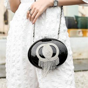 Coco Diamond Tassels Duffle le sac fourre-tout UFO OVAL CROSSBOCK BLACK BLANC SOIR DESIGNES Sacs à main d'épaule Fashion Luxury Wo311l