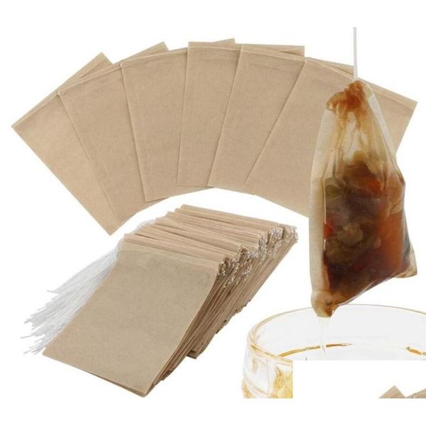 Herramientas de té de café 100 unids / lote Bolsas de filtro Bolsa de papel natural sin blanquear Infusor desechable Vacío con Dstring para hierbas 6x8 cm Drop de OTE0I