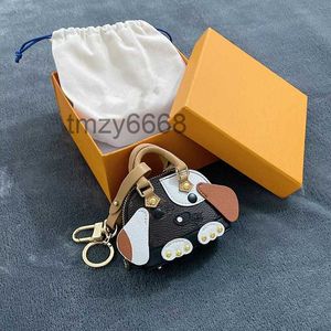 Porte-monnaie Porte-clés Porte-clés avec boîte de luxe en cuir Style chien Petits sacs Pendentif Chaînes de voiture Boucle Porte-clés Lettre Qualité Femmes Sac Accessoires GASC