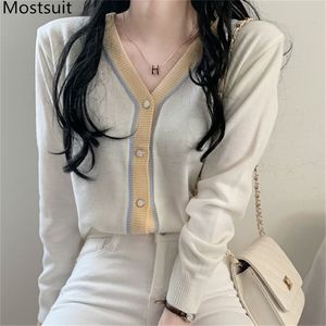 Kleur-geblokkeerde V-hals gebreide vrouwen vest trui volledige mouw single-breasted Koreaanse elegante tops lente mode jumpers 210513