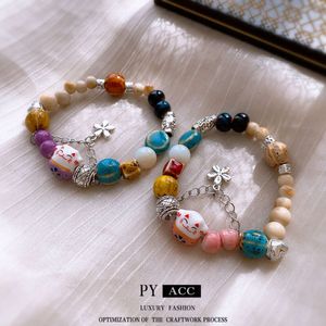 Chaîne de fleurs de chat en céramique colorée Élastique petite, fraîche, douce et polyvalent bracelet de mode artisanat pour les femmes