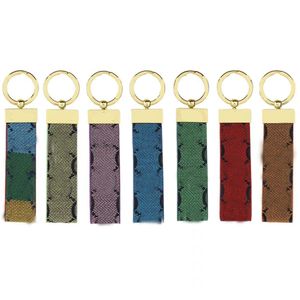 Porte-clés colorés porte-clés de créateur de mode lanières porte-clés en métal pour hommes porte-clés de voiture en cuir pendentif à breloque de sac porte-clés unisexe accessoires de mode classiques