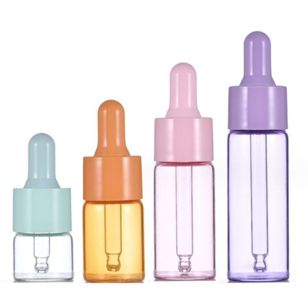 Opción colorida 5ml 10ml 15ml 20ml Botellas cuentagotas de vidrio para cosméticos Aceite esencial con tapas correspondientes