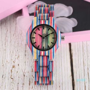 Kleurrijke houten klok Unieke snoepkleur Top Luxe klok Dameskwarts Volledig bamboe Houten armband Dameshorloge Pulse Reloj Muir J0515