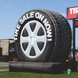 Utilisation commerciale de 8 mh (26 pieds) avec un ventilateur de ballon de pneu gonflable géant Roue de voiture personnalisée sur le camion pour la publicité