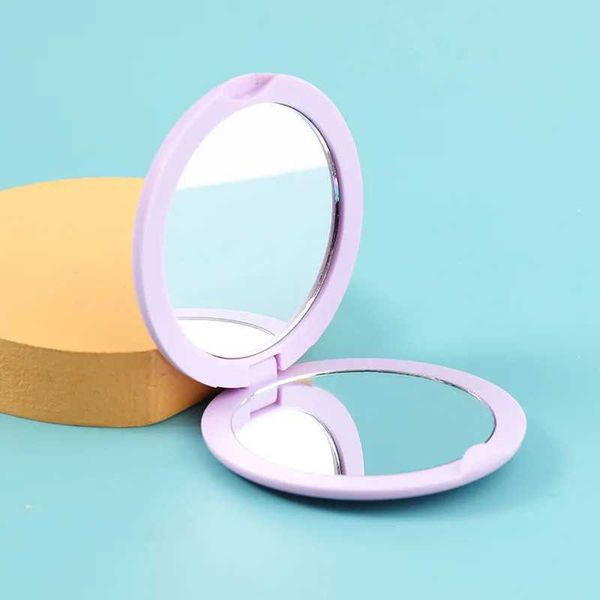 Espejos compactos 1 espejo de maquillaje plegable de bolsillo circular portátil adecuado para niñas mini diseño acesorías al por mayor 4 colores Q240509