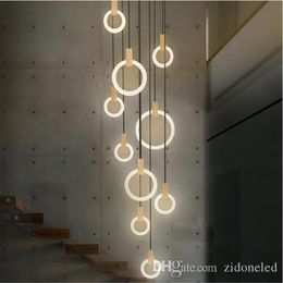 Le lustre contemporain de LED allume les droplighs menés nordiques anneaux acryliques éclairage d'escalier 3 5 6 7 10 anneaux luminaire intérieur 297O