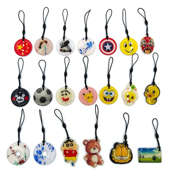 Contrôle 20pcs / lot multiples motifs 125 kHz T5577 5200 Écrivable RFID RFID TAL TAG SMART Key Cartoon Badge Control Carte