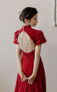 Conventionele Chinese Cheongsam-trouwjurken Hoge hals rugloze zeemeermin bruidsjurken Sweep-trein applique wijnrode kanten trouwjurk