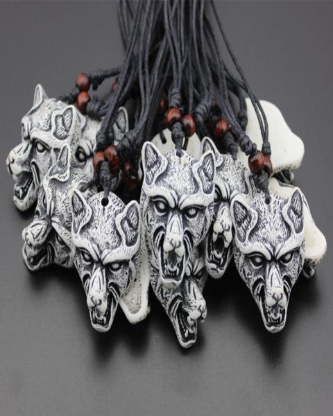 Cool 12pcs Boy Men039 I Imitation Yak Bone Talling White Wolf Head Pendants Amulets Collares Regalo MN3043638811