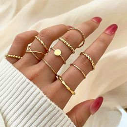 Estilo fresco nuevo para mujeres con luz de lujo de lujo giros de masa frita cross 10 piezas Índice anillo de dedos