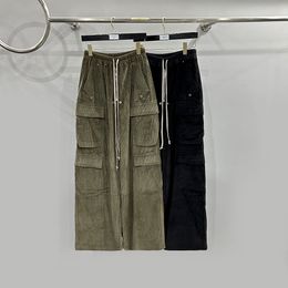 Ropa de trabajo de pana verde con bolsillos grandes y pantalones informales de pierna ancha, pantalones de gran tamaño para hombre, pantalones elásticos rectos sueltos para hombre