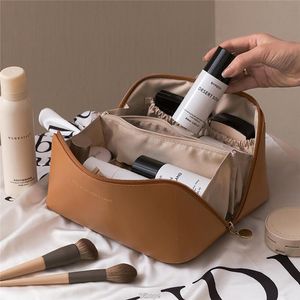 Cosmetische tassen kasten grotendeels reistas draagbaar lederen make -up zakje vrouwen waterdichte badkamer washas multifunction toilettaskit 230503