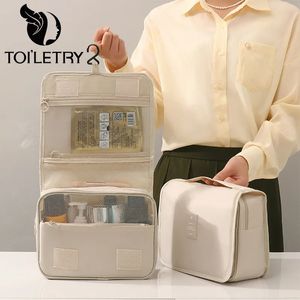 Sacs à cosmétiques cas de toilette maquillage couleur unie coréen pliable voyage PVC imperméable grande capacité articles de toilette hangbag stockage 231030
