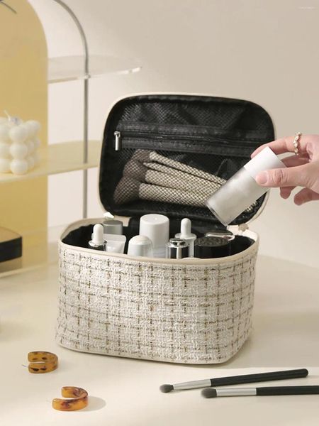 Bolsas cosméticas Bolsa de maquillaje de estilo europeo y americano Gran capacidad Alto valor Super Portable Cosméticos Almacenador de almacenamiento