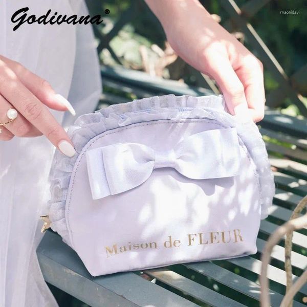 Sacs de cosmétiques en dentelle d'été japonaise Organza macaron coquille de mode Fashion Migne Girl Ladies Bowknot Small Leather Clutch