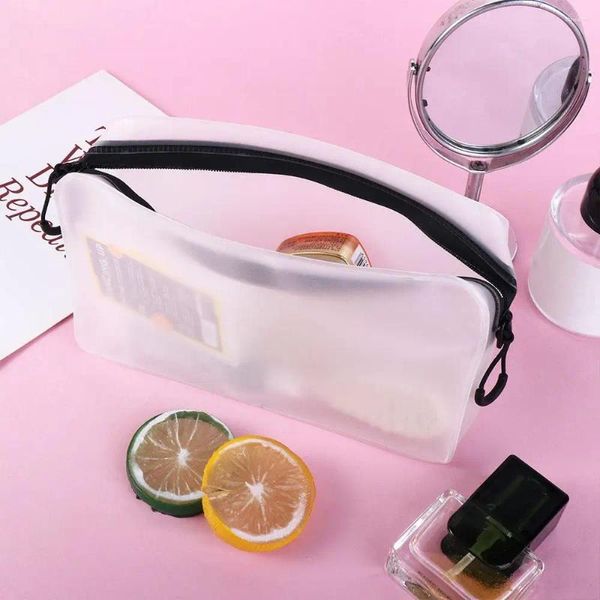 Bolsas de cosméticos Bolsa de aseo Organizador de maquillaje femenino Bolsa de lavado con cremallera Almacenamiento Película suave Estuche mate transparente