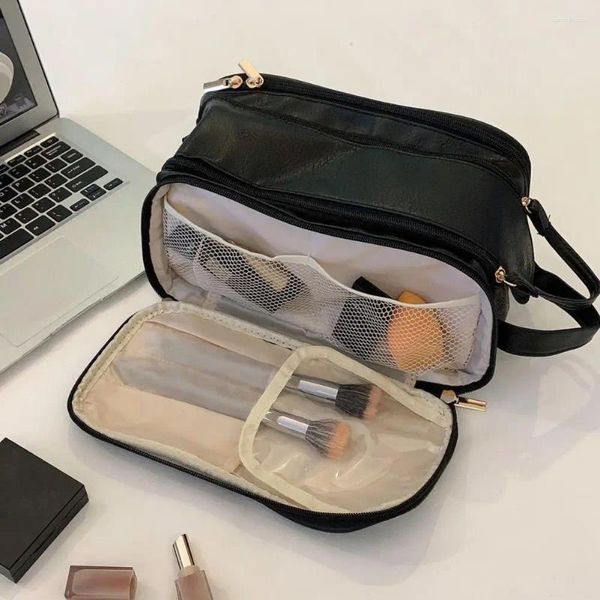 Sacs de cosmétiques Vanité de voyage Capacité de sac étanche avec des poches en filet à fermeture éclair zipper poignée de toilette pour le maquillage