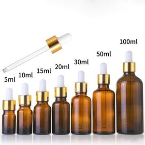 Bouteilles de parfum vides d'huiles essentielles d'huile d'essence cosmétique avec le chapeau d'or en gros