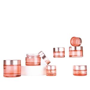 Pot cosmétique en gros verre rose crème pour le visage pot pot vide bouteille épaisse cosmétique conteneur de voyage rechargeable avec or rose Dhgarden Dhdlj