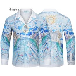 Camisas cosplay casablanca nueva mezquita cielo azul, nube blanca, pez volador, camisa de manga larga con estampado de aviones, para hombre