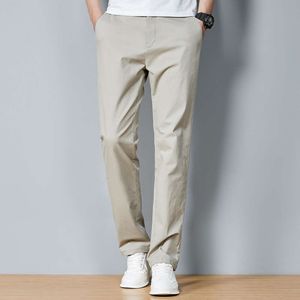 Katoen Casual lente en zomer rechte pijpen voor heren Koreaanse slim fit broek, jeugd effen kleur veelzijdige pantalon