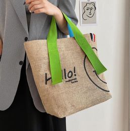 Katoen dubbelzijdig afdrukken smiley gezicht tas 2021 Japanse literatuur kunst vrouwelijke tassen kleur matching grote capaciteit handtas mode bakken