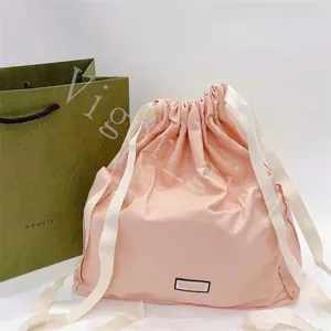 Bolsas de cosméticos de mostrador G Marca Pequeñas bolsas de maquillaje con cordón floral Bolsa de compras Gran capacidad Color rosa Estuche de maquillaje de alta calidad Can Floding Designer Girl Monedero Nuevo