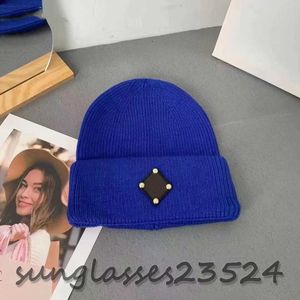 Couple créateur de mode bonnet femmes bonnet de maintien au chaud couleur bonbon motif broderie en automne et hiver bonnets chapeau bleu