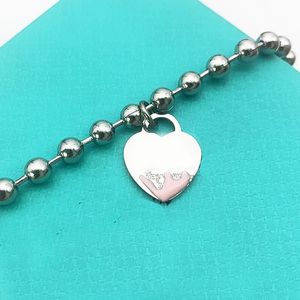 Pulsera de corazón para pareja, cadena de hebras con cuentas femeninas en la mano, joyería de moda de acero inoxidable, regalo de Navidad para el día de San Valentín para novia, accesorios al por mayor