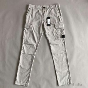 Cp Companys Pants Le plus récent vêtement teint Cp Companys pantalon cargo un pantalon de poche à lentille en plein air Cp Compagny hommes pantalon tactique survêtement 6665