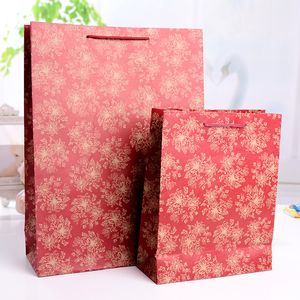 bolsas de papel de regalo de papel artesanales para bolsas para el bolso de caramelo de la boda de los bolsos al por mayor Bolsa de compra de protección ambiental