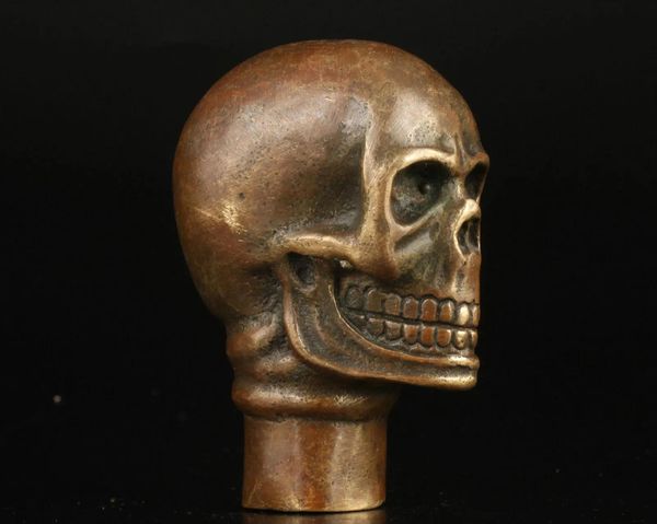 Artesanía asiática china bronce antiguo hecho a mano estatua de calavera tallada cabeza de bastón