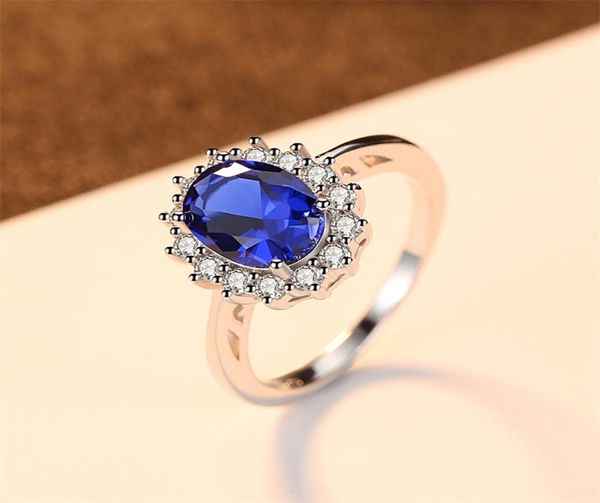 Création des bagues de mariage Blue Sapphire Ring Princess Crown Halo 925 Anneaux en argent sterling pour les femmes 2021 1227 T251059834531185