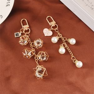 Creative alliage porte-clés rétro Imitation perle cristal porte-clés mode sac métal accessoires voiture porte-clés bijoux Couple cadeaux