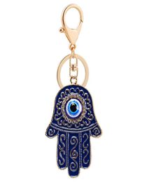 Creative Blue Eyes Keychain Poursis Charmes Crystal Rignestone Key Chain Ring Holder Car Cortes de voiture1254395