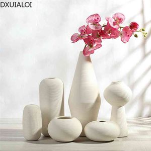 Creative céramique céramique vase blanc Ornements moderne minimaliste salon décoration de la maison accessoires arrangement de fleurs cadeau 210811