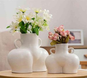 Vase de bureau en céramique créatif Récipient de plantes de bureau humain art en forme d'art décoratif de fleur anneau latérale manche de la maison de la maison 2104098088076