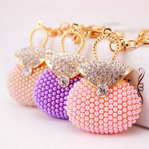 Creativo lindo bolso de perlas rosa llavero de modelado bolso de mujer accesorios colgante de Metal regalo romántico G1019