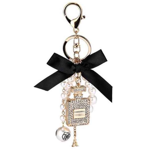 Porte-clés créatif en forme de bouteille de parfum en diamant, pour sac de voiture, pendentif avec nœud en perle, accessoires de décoration, cadeau de fête