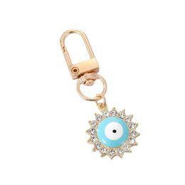 Creatieve diamanten set druipende olie blauwe ogen liefde sleutelhanger legering zonvormige auto tas sleutelhangers hanger cadeau-accessoires in bulk