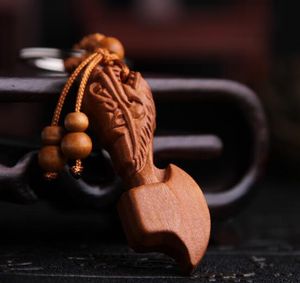 Creative Dragon Axe Perzik Wood Key Chains voor unisex Lady Men Car Keyrings Natural-Wood Keychains Leuke geschenken