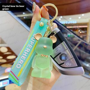 Mode créative mignon Transparent cristal nœud papillon ours voiture porte-clés résine poupée porte-clés Couple sac pendentif