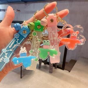 Creatieve nieuwe productkikkerolie vloeistof drifting fles sleutelhanger vrouwelijke schattige konijnen cartoon met handcadeau sieraden