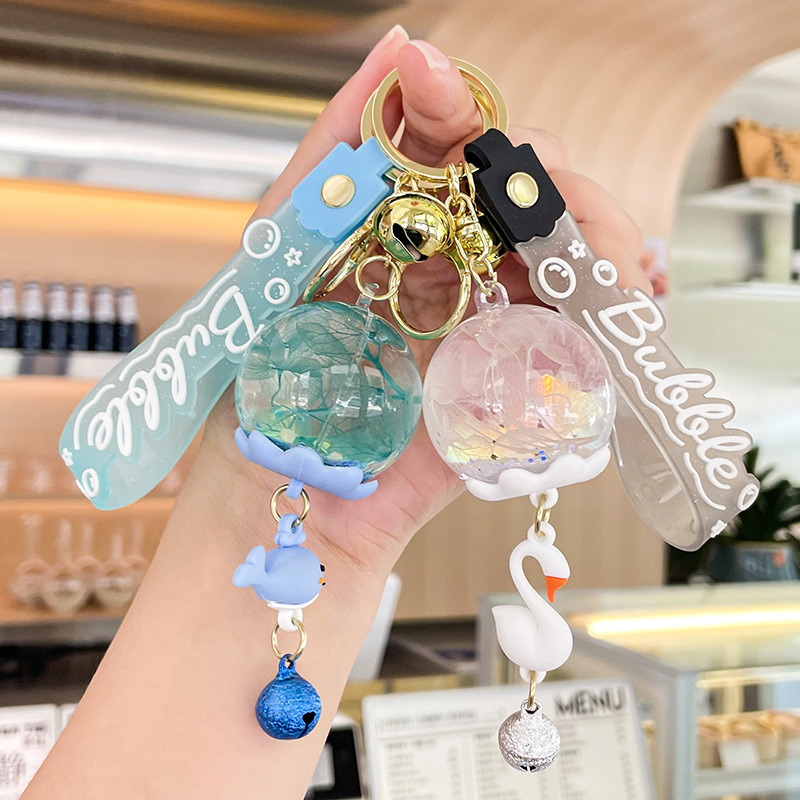 Creative oil wind chime floating keychain hanging exquisite girl bag pendant claw machine stall small gift wholesale
